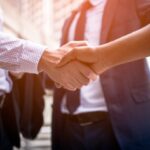 Two people shaking hands