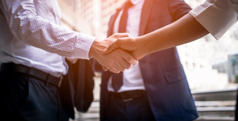 Two people shaking hands