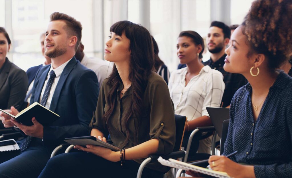 Audience attending an in-person event.