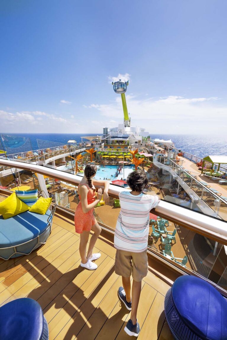 OY, Odyssey of the Seas, young friends, teens, boy and girl in Teen Zone patio, looking over pool, North Star in distance, upper level,