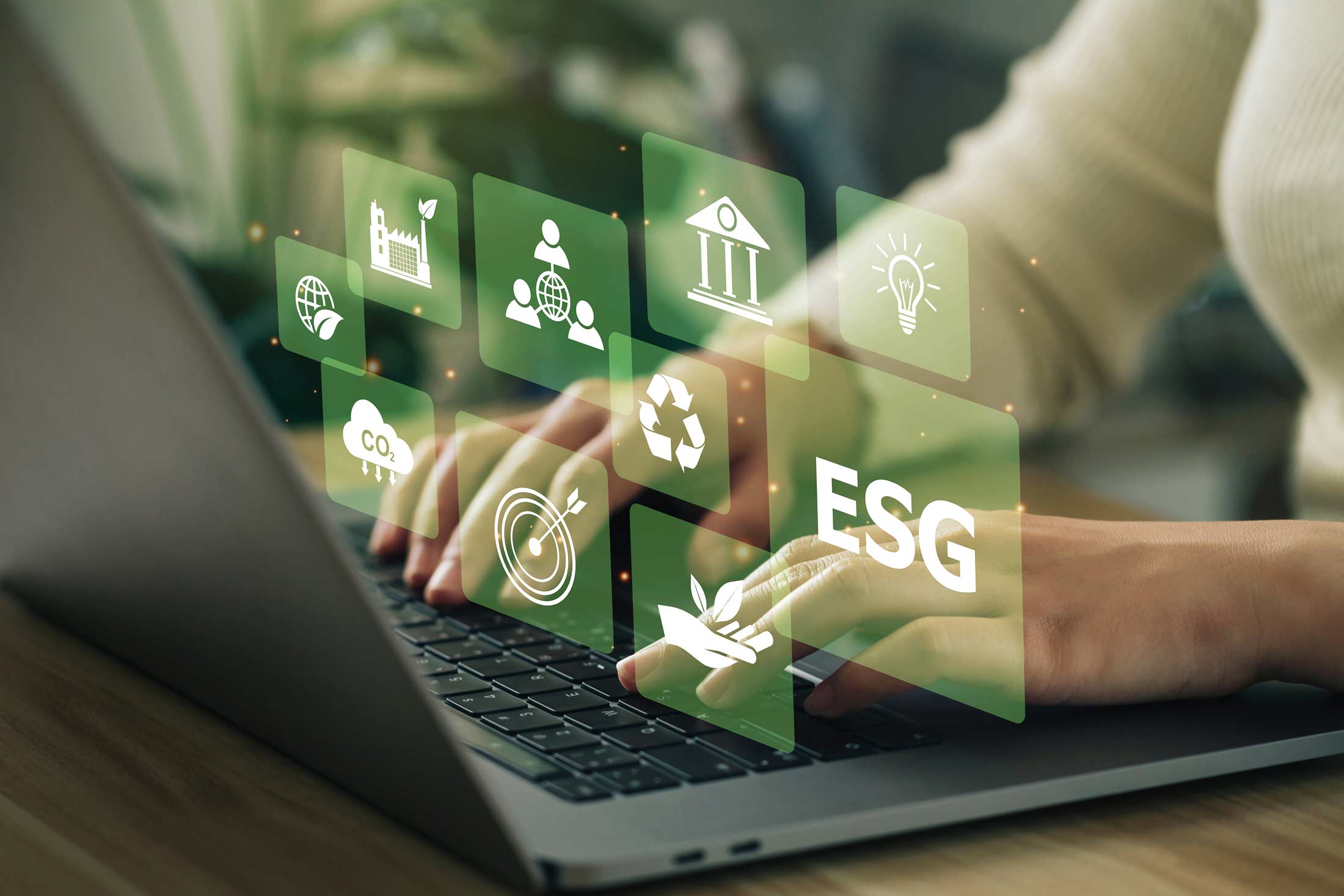 Woman analyzing ESG on a laptop