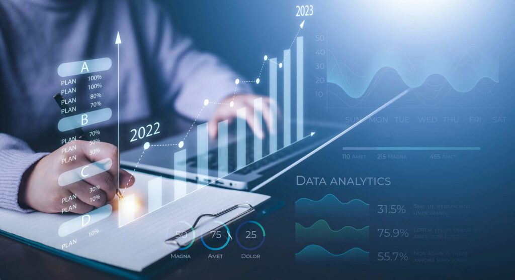 Man analyzing 2023 data on laptop