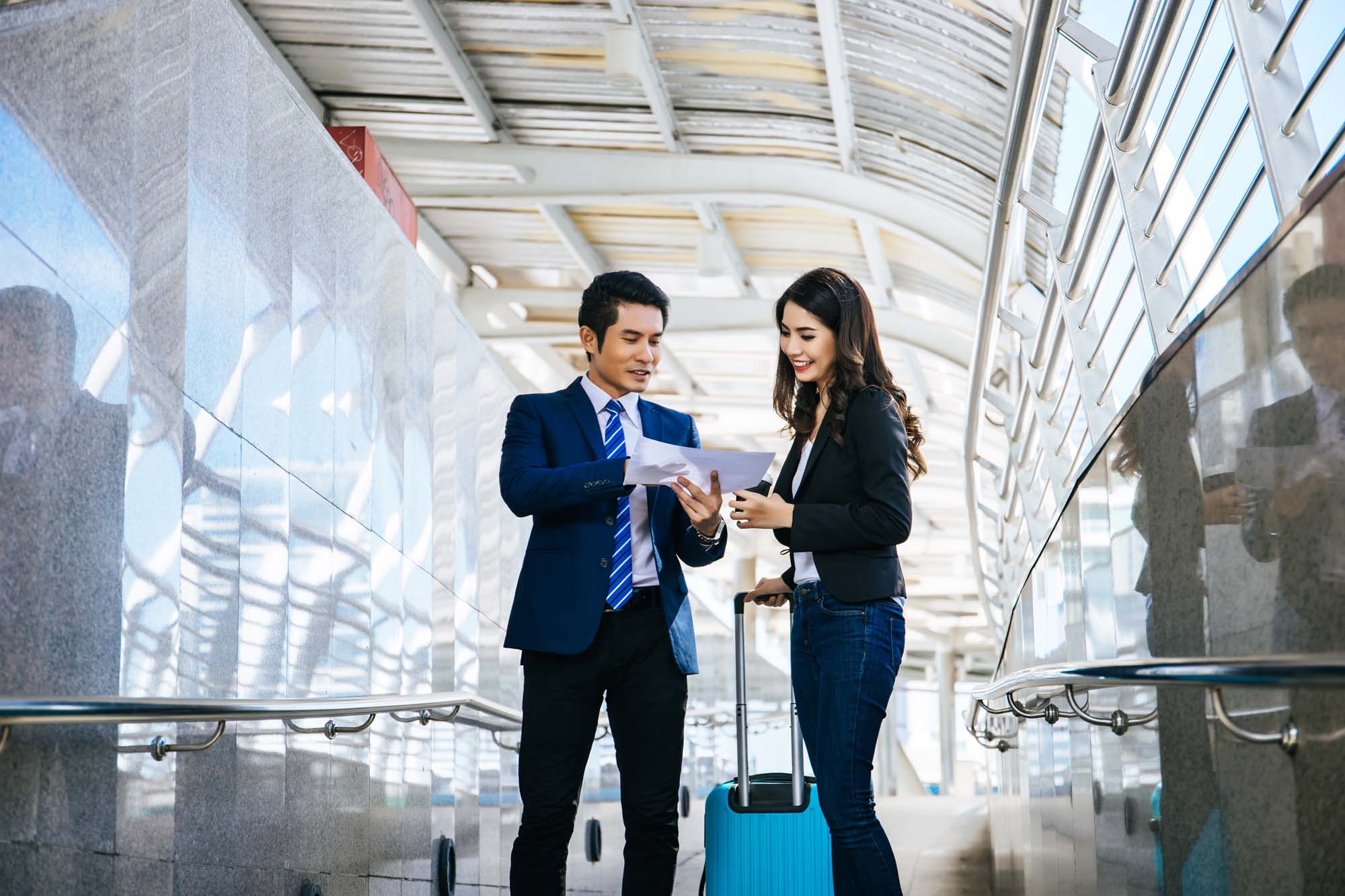 Portrait of two business people meeting before go to traveling.