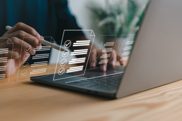 Individual working on laptop