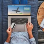 Online booking and buying plane tickets using computer and credit card