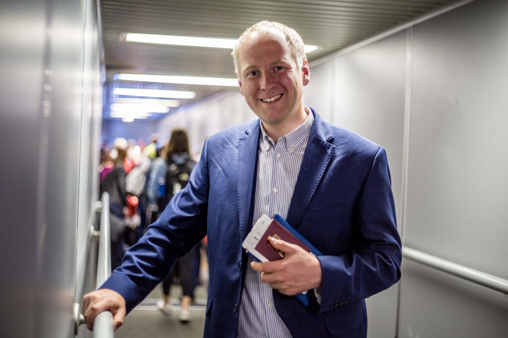 Businessman leaving the plane.