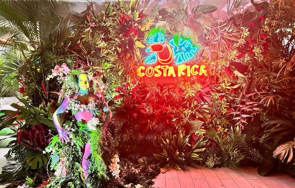 Topical jungle setting with neon sign for Costa Rica