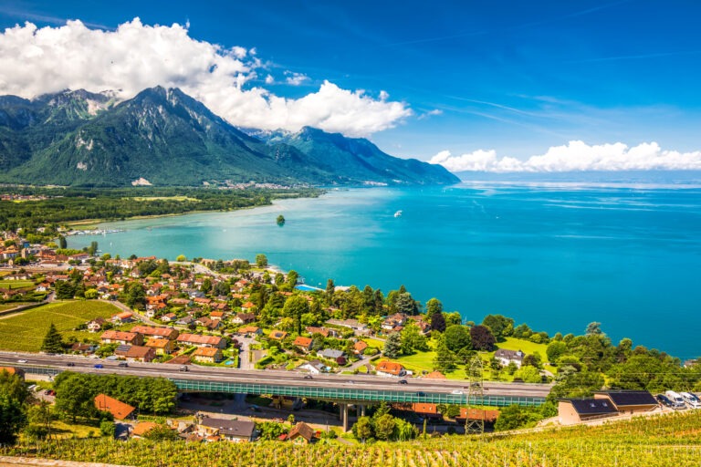 Panorama view of Villeneuve city with Swiss Alps, lake Geneva and vineyard on Lavaux region, Canton Vaud, Switzerland, Europe.