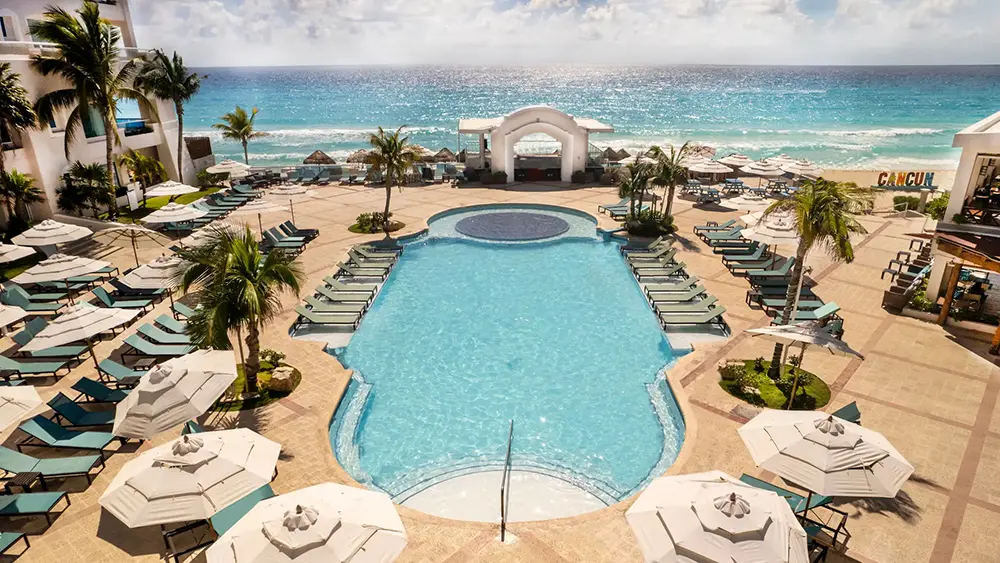 Sunscape-Cancun-Resort-Aerial-Pool-Umbrellas.jpg