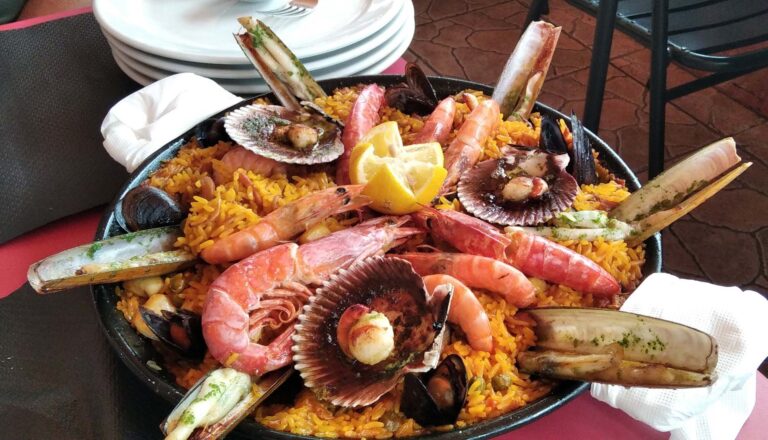 Andalusian fish and seafood paella, served in a typical seaside
