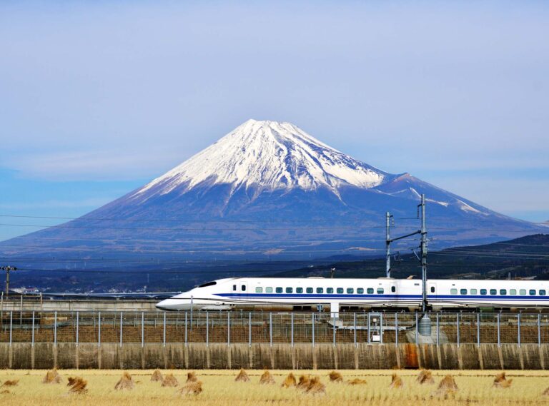 A bullet train passes below Mt. Fuji in Japan.