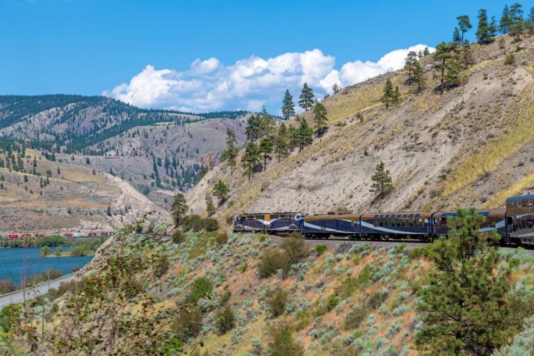 Rocky mountaineer locomotive with gold and silver leaf train wag