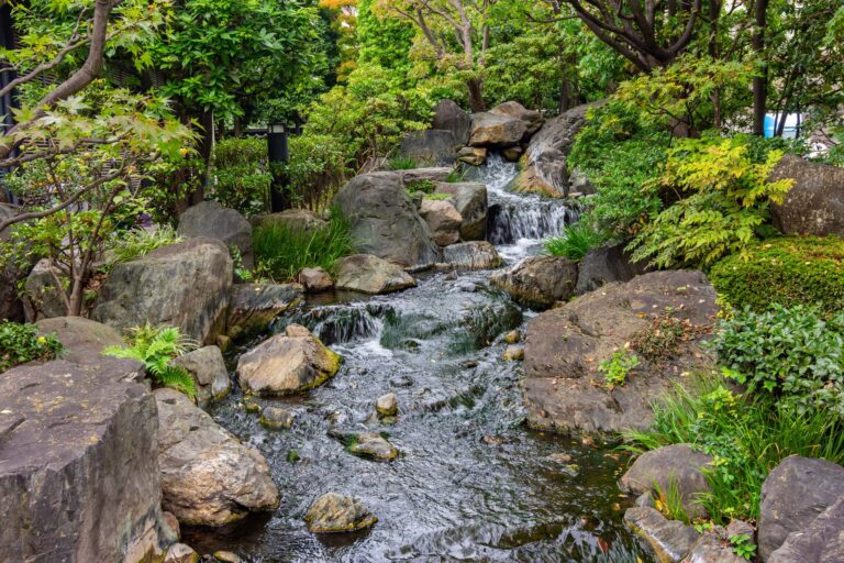 Tokyo, Japan - 16 November 2024: Waterfall in garden of Senso-ji temple in Asakusa