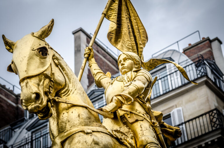 The golden statue of Saint Joan of Arc on the Rue de Rivoli in Paris, France.
sculpted by Emmanuel Fremiet in 1864.