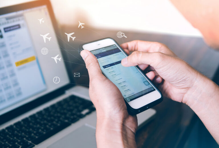 Flight booking, Hand holding mobile phone with Online booking, T